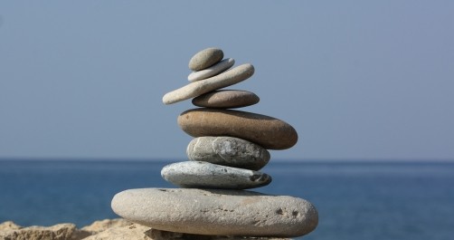 stones balancing on beach